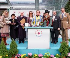 HRH The Princess Royal present Jockey with winners trophy